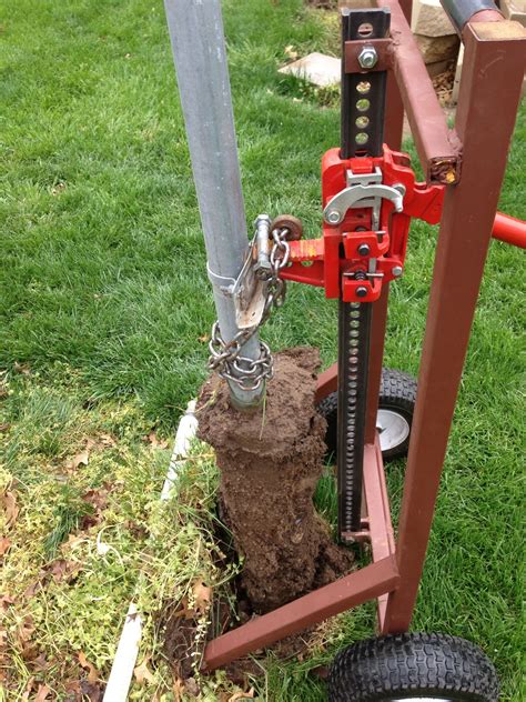 pulling up metal fence post